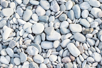 white stones on the beach, close-up of stones