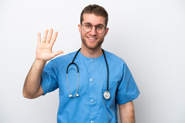 Young surgeon doctor caucasian man isolated on white background counting five with fingers