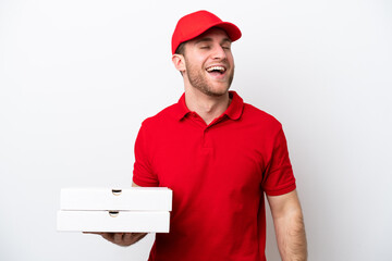 Pizza delivery caucasian man with work uniform picking up pizza boxes isolated on white background...