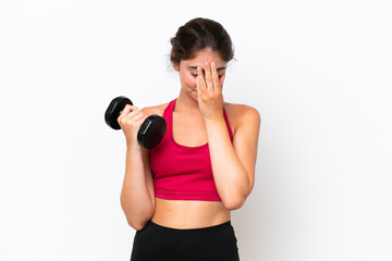 Young sport caucasian woman making weightlifting isolated on white background with tired and sick...