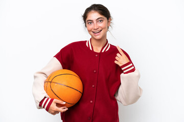 Young basketball player woman isolated on white background giving a thumbs up gesture