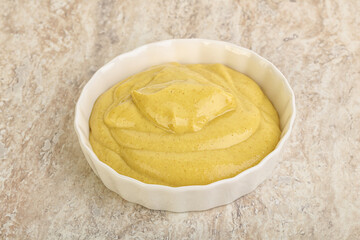 Organic mustard sauce in the bowl