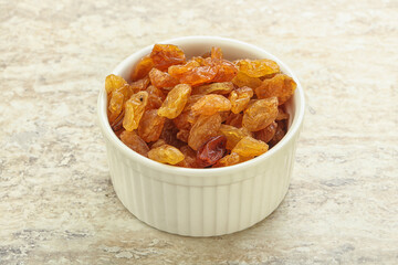 Sweet yellow raisin in the bowl