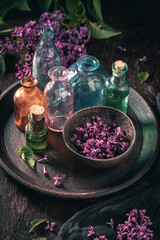 Unique and aromatic lilac aromatic oil. Lilac flower products.