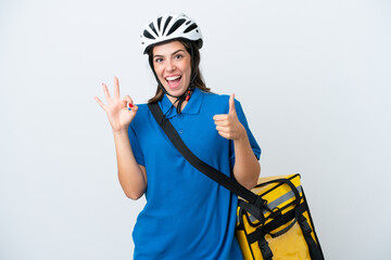 Young delivery woman with thermal backpack isolated on white background showing ok sign and thumb up gesture
