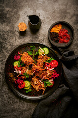 Baked veal liver with kataifi and onion