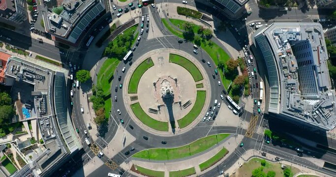 Top view of the city center of Lisbon Portugal, cars move in a circular motion through the streets of the city. European city on the ocean