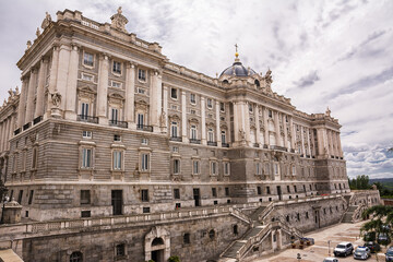 Fototapeta na wymiar Facade of the royal palace in Madrid from the side of the Sabatini Royal Gardens
