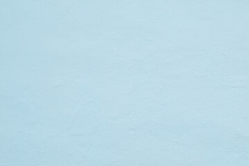 Beautiful Abstract Grunge Decorative Light Blue Cyan Painted Stucco Wall Texture. Handmade Rough Winter Christmas Paper Wide Background With Copy Space
