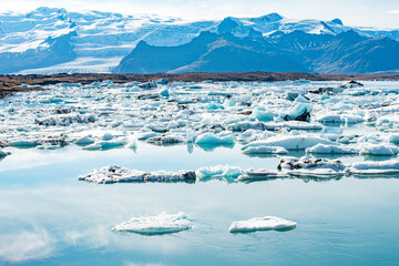 Jökulsarlon glacier lagoon and Vatnajokull glacier in Jökulsarlon. Vatnajokull is one of the...