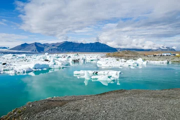 Foto auf Acrylglas Jökulsarlon glacier lagoon and Vatnajokull glacier in Jökulsarlon. Vatnajokull is one of the largest glaciers in Europe. © rolf_52