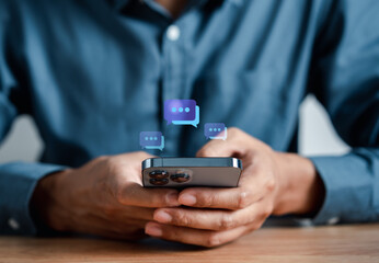 Businessman using smartphone chatting to send message to communication and social network connection online  technology concept.