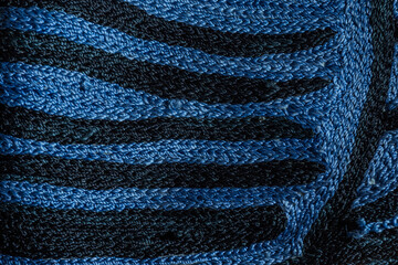 Abstract background closeup of embroidery with art stitches. Rough Coarse thread, thick seams....