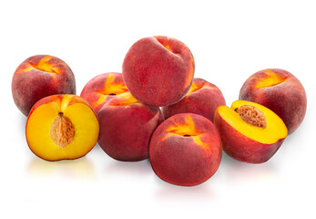 Peaches on a white isolated background. Ripe fresh tropical nectarine fruit piece with pit.