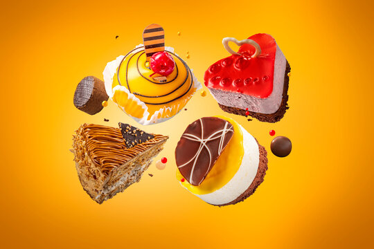 Various levitating cakes with fruit jelly chocolate decoration. Exquisite Fresh delicious mousse dessert on colored background.