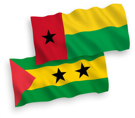 Flags of Saint Thomas and Prince and Republic of Guinea Bissau on a white background