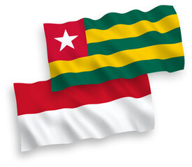 Flags of Indonesia and Togolese Republic on a white background