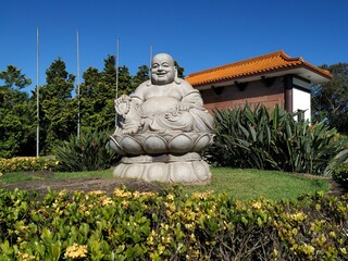 Buddha stone statue in a peaceful garden
