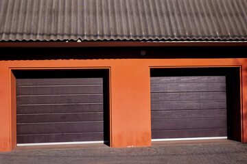Double garage door. Modern, large automatic up and over. Close- up photo with selective focus.