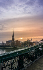 Naklejka premium Sunrise over a church in frankfurt