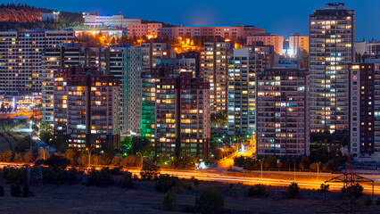 Fototapeta na wymiar Residential apartment modern housing at dusk - A housing complex near Konutkent Station - Ankara , Turkey