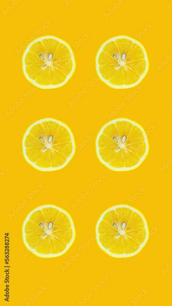 Poster lemon slices rotating on yellow background. stop motion citrus animation. healthy eating and refresh