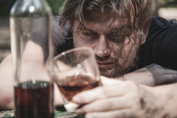 Addiction and Inner Emptiness: psychological problems of people. Antisocial behavior of a young man with dissociative disorders escapes reality and life's unlived difficulties. Portrait of young man. 