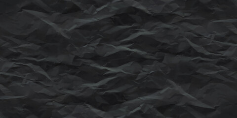 Black creased crumpled paper texture can be use as background. Ragged black Paper. black waxed packing paper texture.	