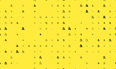 Seamless background pattern of evenly spaced black yoga stretching pose symbols of different sizes and opacity. Vector illustration on yellow background with stars