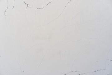 close up retro white color cement wall with cracked background texture for show or advertise or promote product and content on display and web design element concept