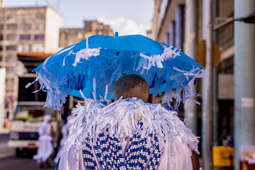 Members of the traditional carnival block Filhos de Gandy parade in the streets during the 2018...