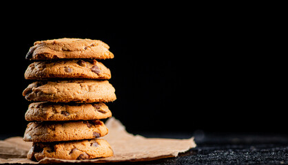A pile of milk chocolate cookies. 