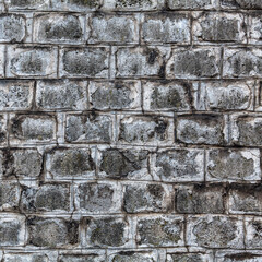 Grunge wall background build from huge gray bricks