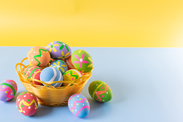 Easter eggs many color in basket for easter background