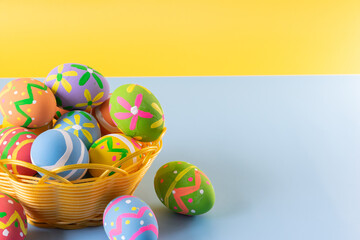 Easter eggs many color in basket for easter background