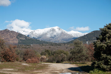 Snow on the peaks of the mountains of La Bola del Mundo and La Maliciosa in the Sierra de Madrid at the beginning of winter
