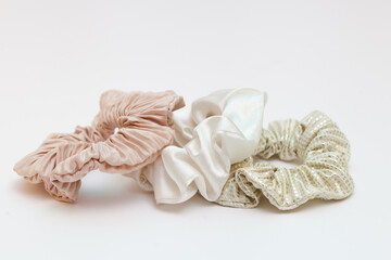 beige silk scrunchies or hair tie. Luxury hairdressing tools for girls perfect for all hair types.