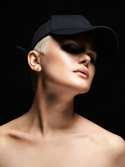 Short Hair Beautiful young woman in Hat. sensual blond girl with make-up