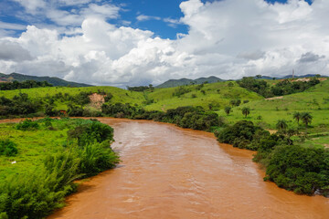Fototapeta na wymiar Paraopeba river overflowing after summer rains in Brumadinho, Minas Gerais, Brazil. Panoramic
