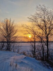 sunset in the winter lake