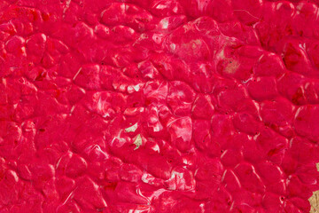 acrylic pink paint texture background on cardboard