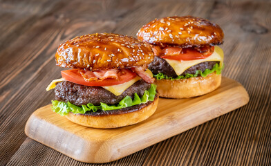 Hamburgers on the wooden board