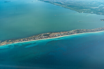 Aerial view of Varadero Peninsula with a long white sand beach and hotel resorts located along the coastline