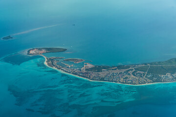 Aerial landscape view of tip of Varadero peninsula and satellite islet Cayo Buba, Cuba, located in Caribbean Sea with Varadero Marina and Hotel resorts along the beach