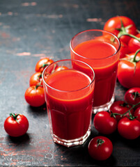 Juice from ripe tomatoes in a glass. 