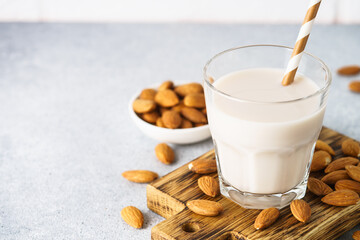 Non dairy milk, almond milk and nuts. Vegan product.