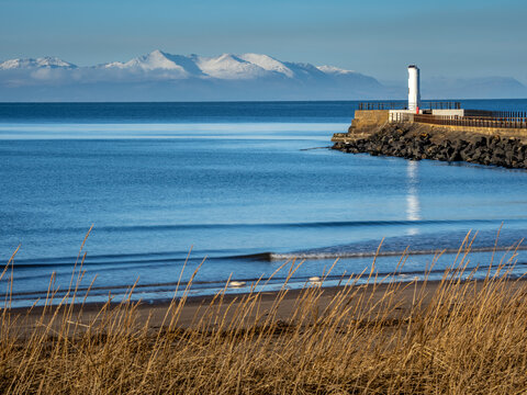 View of the snow capped peaks of the Isle of Arran from Ayr beach