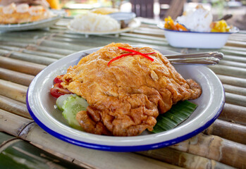 Minced pork omelet, it's egg fry popular traditional Thai Asian style food.