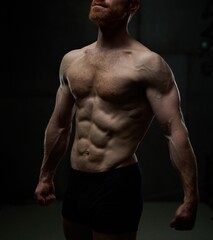 Fototapeta premium Athletic muscular man body. Training, workout, muscular, body building, sport.