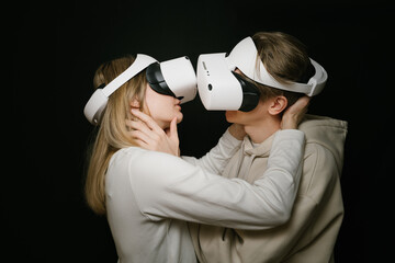 Love kissing couple. Virtual St Valentines day theme. ouple hugging and kissing in VR headset...